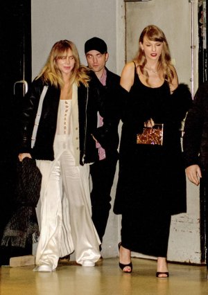 RPPdec.06 23- LEAVING THE POOR THINGS PREMIERE IN NYC.jpg