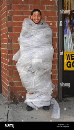 young-man-wrapped-in-bubble-wrap-as-part-of-an-nyu-psychology-experiment-D72R81.jpg