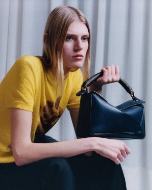 LOEWE Spring Summer 2025 collection.Soft nappa leather, asymmetric waistlines, and silky flora...jpg