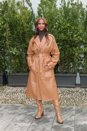 iman-tods-boots-in-python-yellow-milan-fashion-week.webp