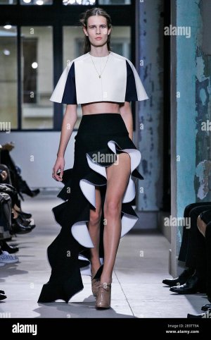 a-model-displays-a-creation-by-french-fashion-designer-nicolas-ghesquiere-for-balenciaga-sprin...jpg a-model-displays-a-creation-by-french-fashion-designer-nicolas-ghesquiere-for-balenciaga-sprin...jpg