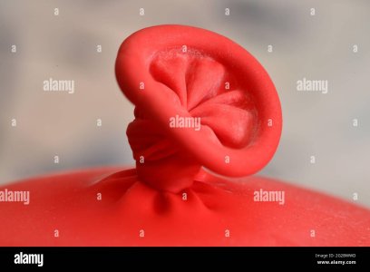 closeup-shot-of-a-red-balloon-knot-for-wallpaper-and-background-2G2BWWD.jpg closeup-shot-of-a-red-balloon-knot-for-wallpaper-and-background-2G2BWWD.jpg