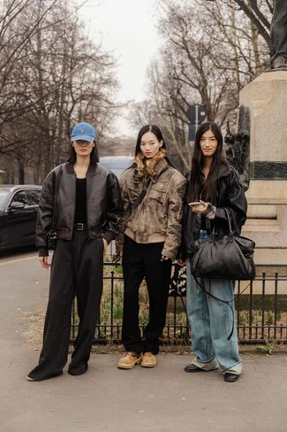 Haojie-Qi-Xinyue-Guo-after-Tods-2026-02-27-MFW-FW26-StreetStyle3-MelodieJeng-MEL_0874.webp