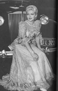 Behind the Scenes of Honky Tonk-Lana Sitting in front of a car.jpg