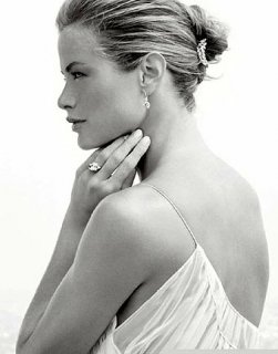 wearing the diamond crescent hair comb by Harry Winston.jpg