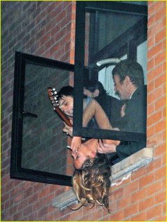 kate-moss-hanging-out-window-04.jpg