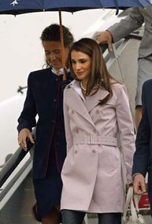 Queen Rania powder pink trenchcoat.jpg