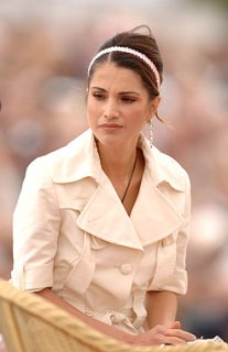 Queen Rania cream trench and matching headband.jpg