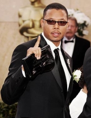 terrence_howard_croc_clutch_sm.jpg