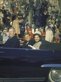 1056699~President-John-Kennedy-and-Wife-Jacqueline-During-the-Inauguration-Day-Parade-Posters.jpg