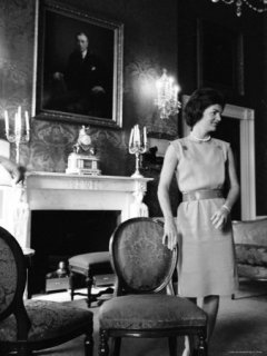 1181588~Jacqueline-Kennedy-Pondering-the-Redecoration-of-the-Red-Room-at-the-White-House-Posters.jpg