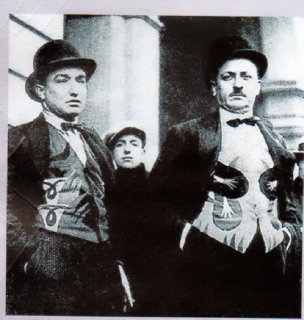 futurist marinetti and depero donning waistcoats.jpg