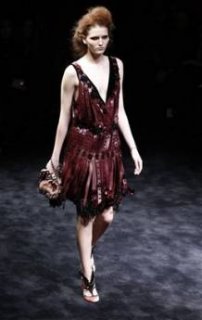 345,http---d.yimg.com-a-p-ap-20090301-capt.0f2cd76b491941f89eba54af260cf809.italy_fashion_mil140.jpg
