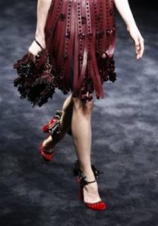 345,http---d.yimg.com-a-p-ap-20090301-capt.f9b837bf2f174ea6b2b5c37a36ee36ab.italy_fashion_mil153.jpg