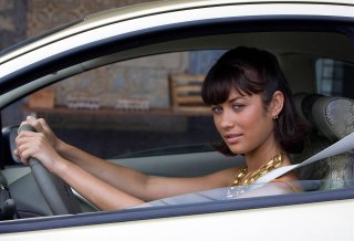 olga-kurylenko-at-the-wheel-of.jpg