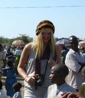 Gemma Ward with local Malawian children.jpg