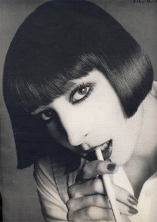 american_vogue_january_1973__angelica_huston__avedon7.jpg