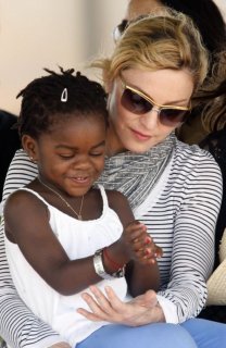 20100406-madonna-laying-brick-raising-malawi-academy-lilongwe-malawi-49.jpg