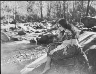 mary philbin in surrender brownlow the parade's gone by.jpg