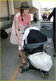 marion-cotillard-lax-landing-with-guillame-and-marcel-05.jpg