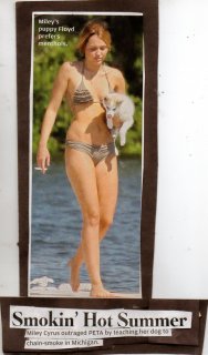 miley cyrus smokes with her puppy.jpg
